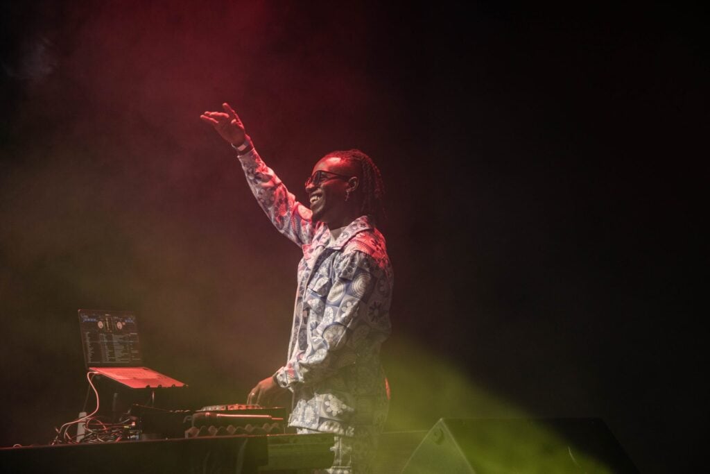 Larizzle hyping a crowd up at one of his DJ sets